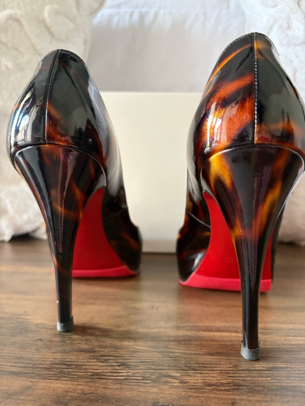 Christian Louboutin Tortoiseshell Patent Pumps with Red Sole